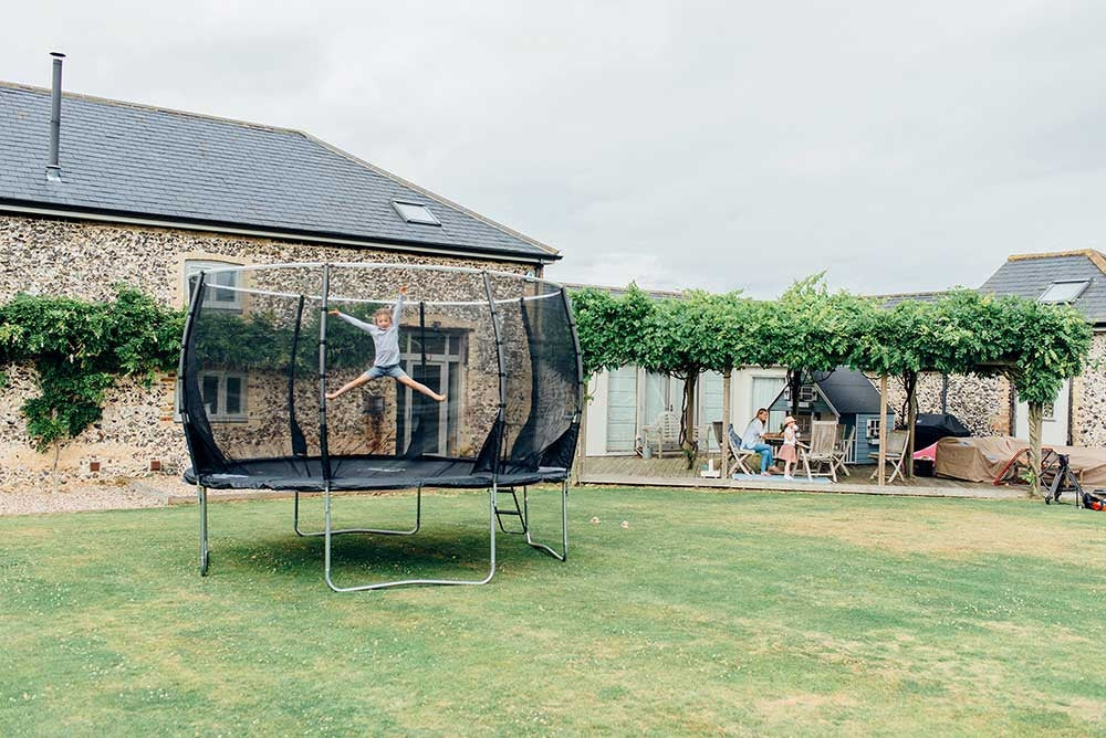 Plum 14ft Magnitude trampoline with 3G Enclosure.