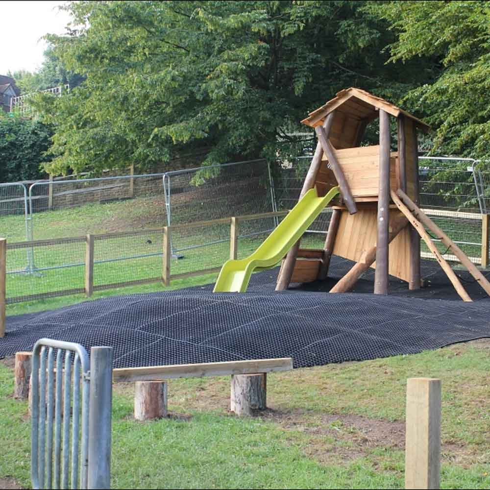 This image shows a large area of mats before the grass has grown through them.