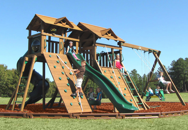 Two tall massive platforms 2 big slides, 2 large rock walls, cargo climber and the big 9ft high swing section. This set is for the biggest kids... yes mums and dads are welcome.