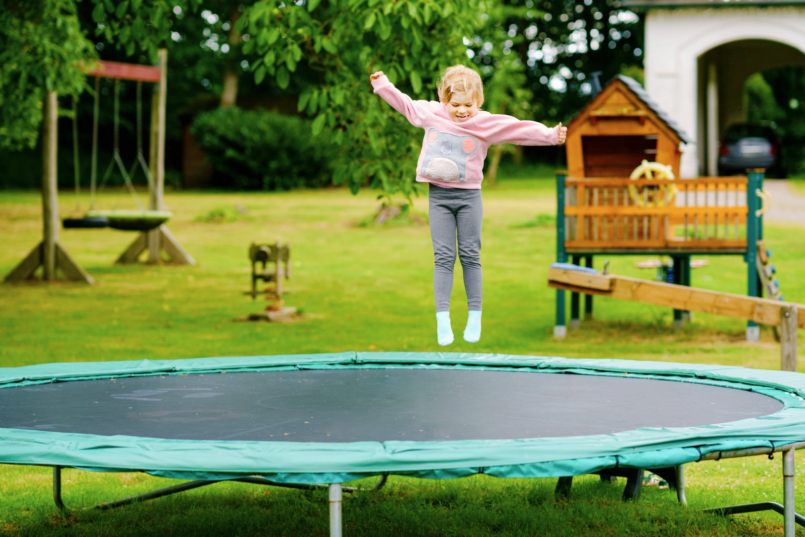 What size trampoline do I need? girl on trampoline