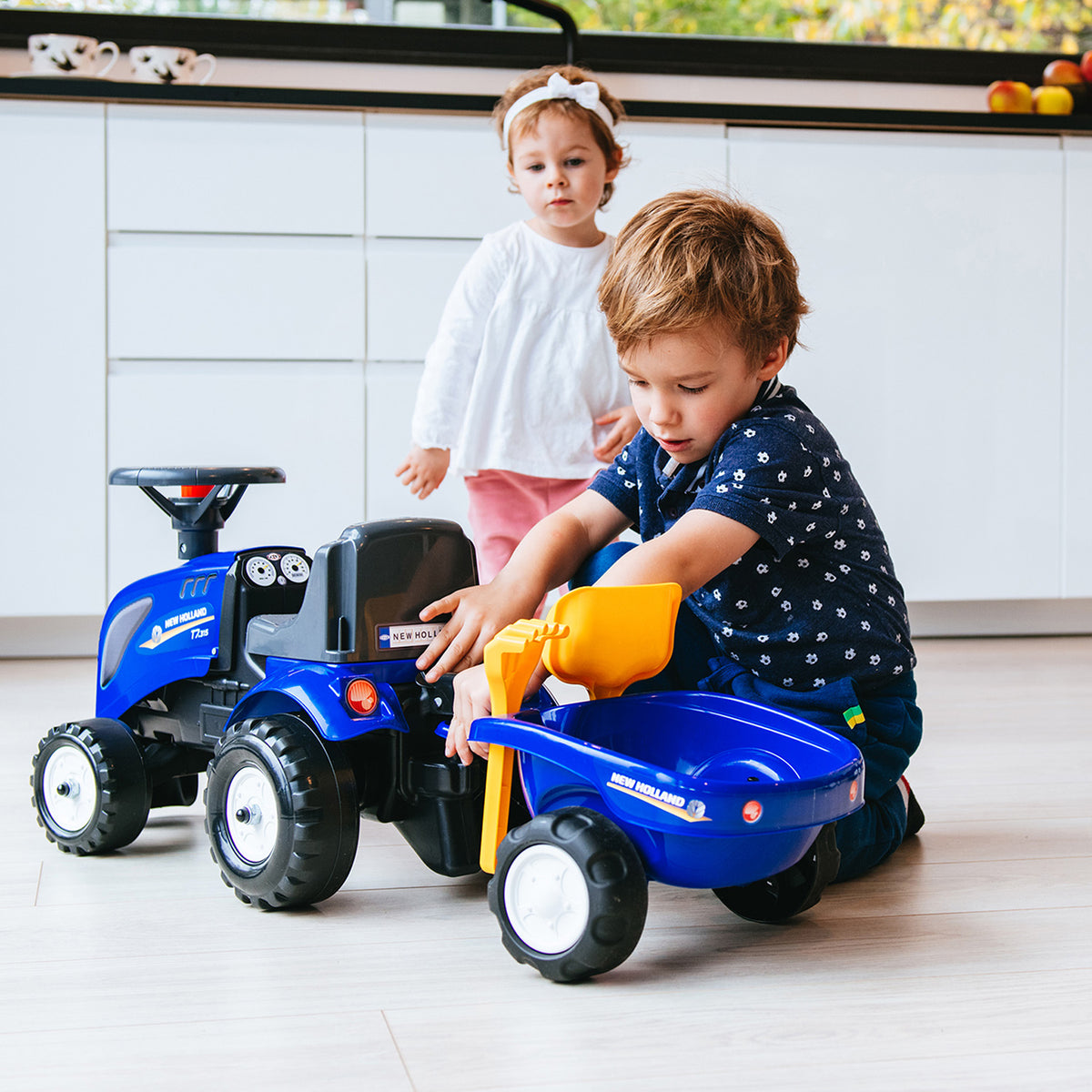 Falk New Holland Ride-On Tractor with Trailer, Rake & Shovel